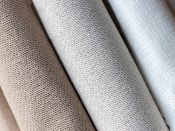 Algodão ou Poliéster: Como escolher a malha ideal para sua produção?