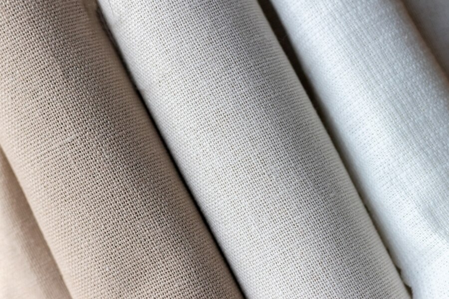 Algodão ou Poliéster: Como escolher a malha ideal para sua produção?