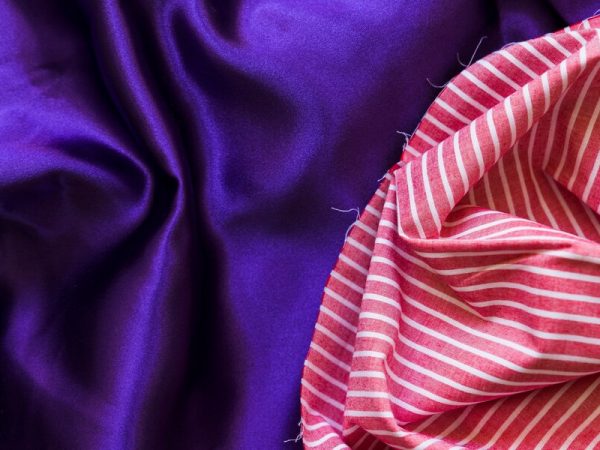 Qual tecido escolher? Comparando a malha PV e PP 100% poliéster